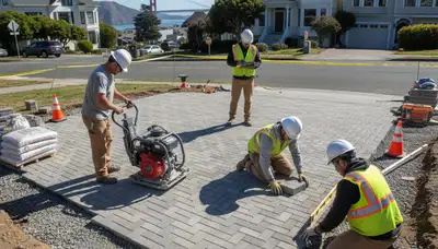 Professional crew installing driveway pavers in San Francisco, CA with precise leveling and craftsmanship